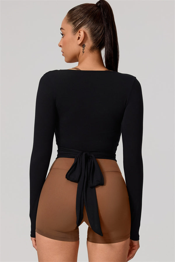Hannah | Overslag longsleeve sporttop met striksluiting