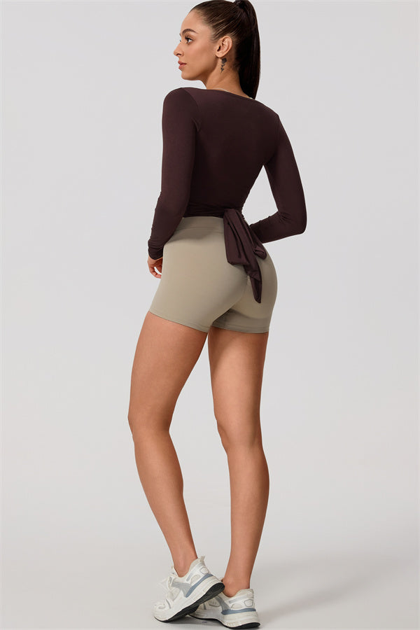Hannah | Overslag longsleeve sporttop met striksluiting