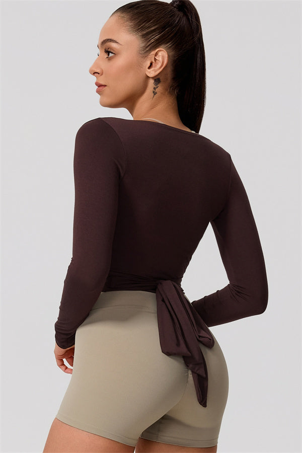 Hannah | Overslag longsleeve sporttop met striksluiting