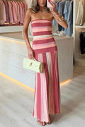 vera | Gebreide off-shoulder maxi jurk met kleurblok en strepen