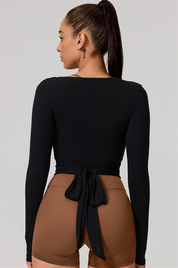 Hannah | Overslag longsleeve sporttop met striksluiting