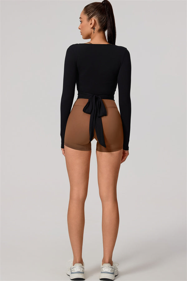 Hannah | Overslag longsleeve sporttop met striksluiting