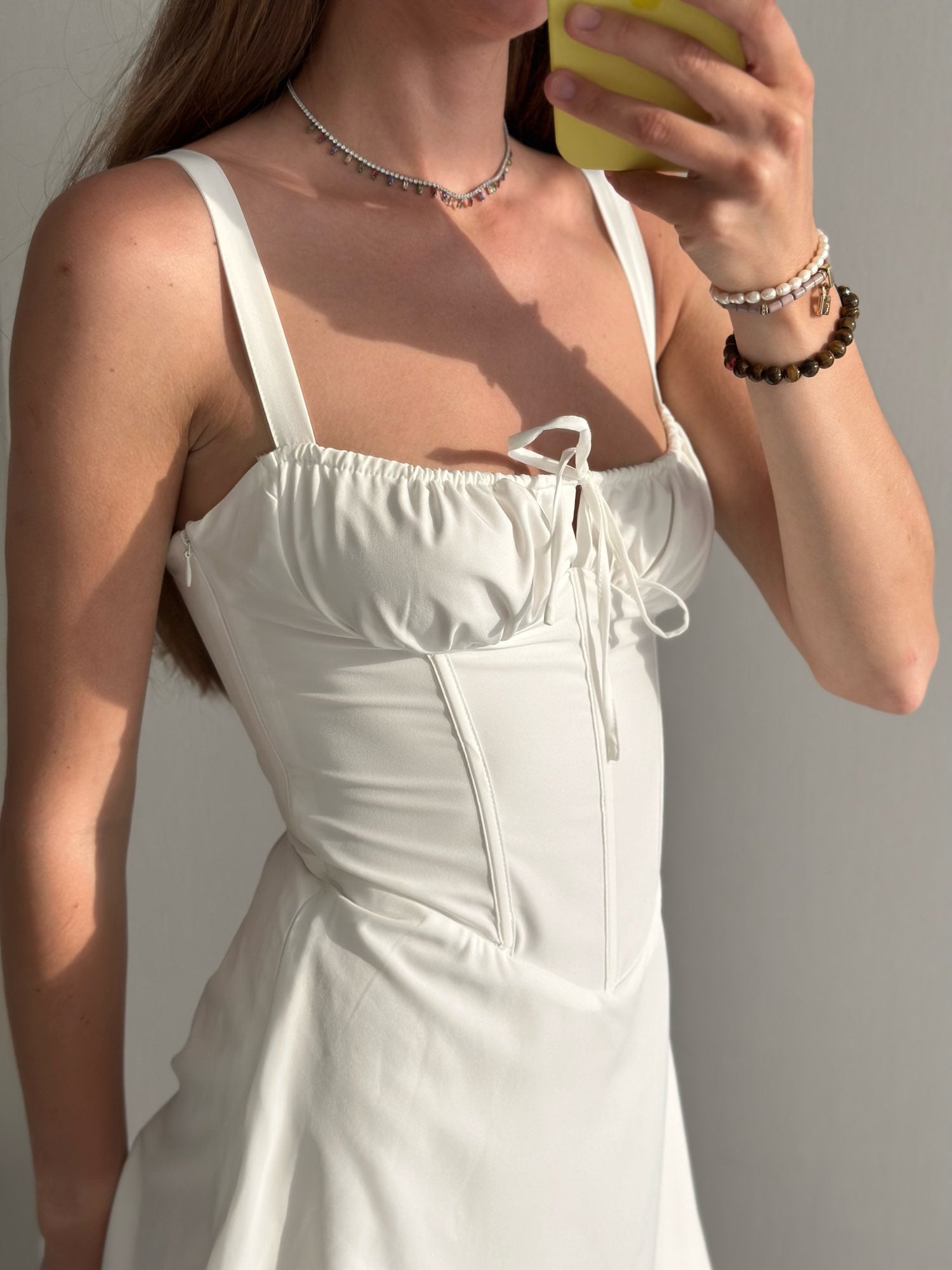 Soof | Mini jurk met strikdetail en corset vorm