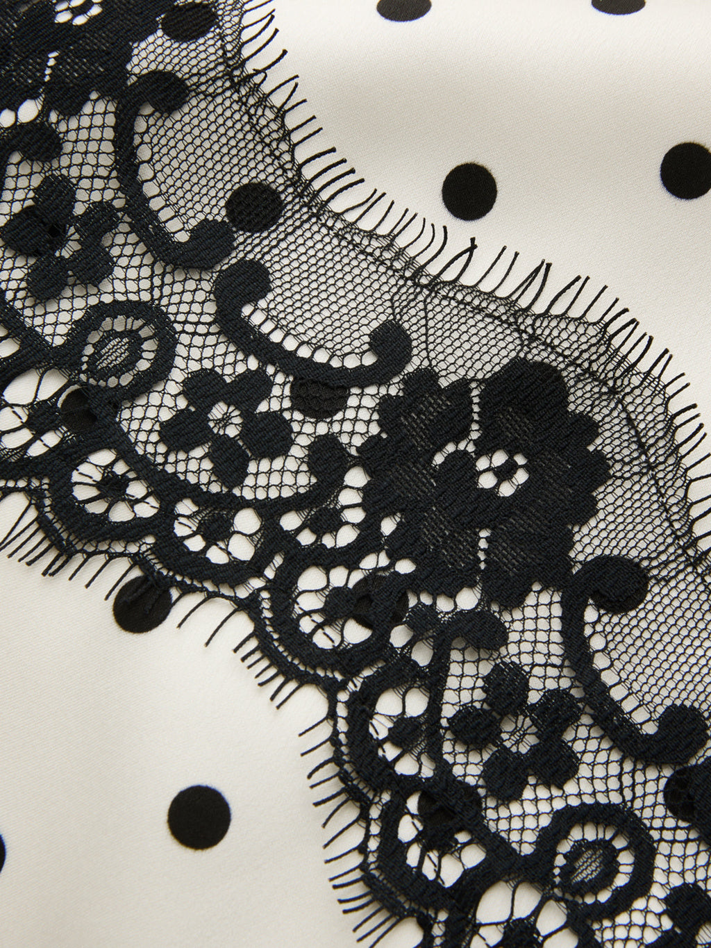 Anique | Satijnen midi rok met stippenprint en kanten details