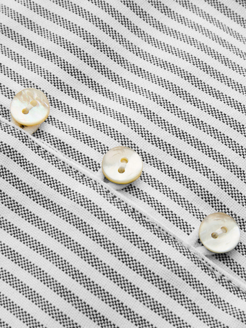 Paulien | Gestreepte tank top met strikdetail en knopen