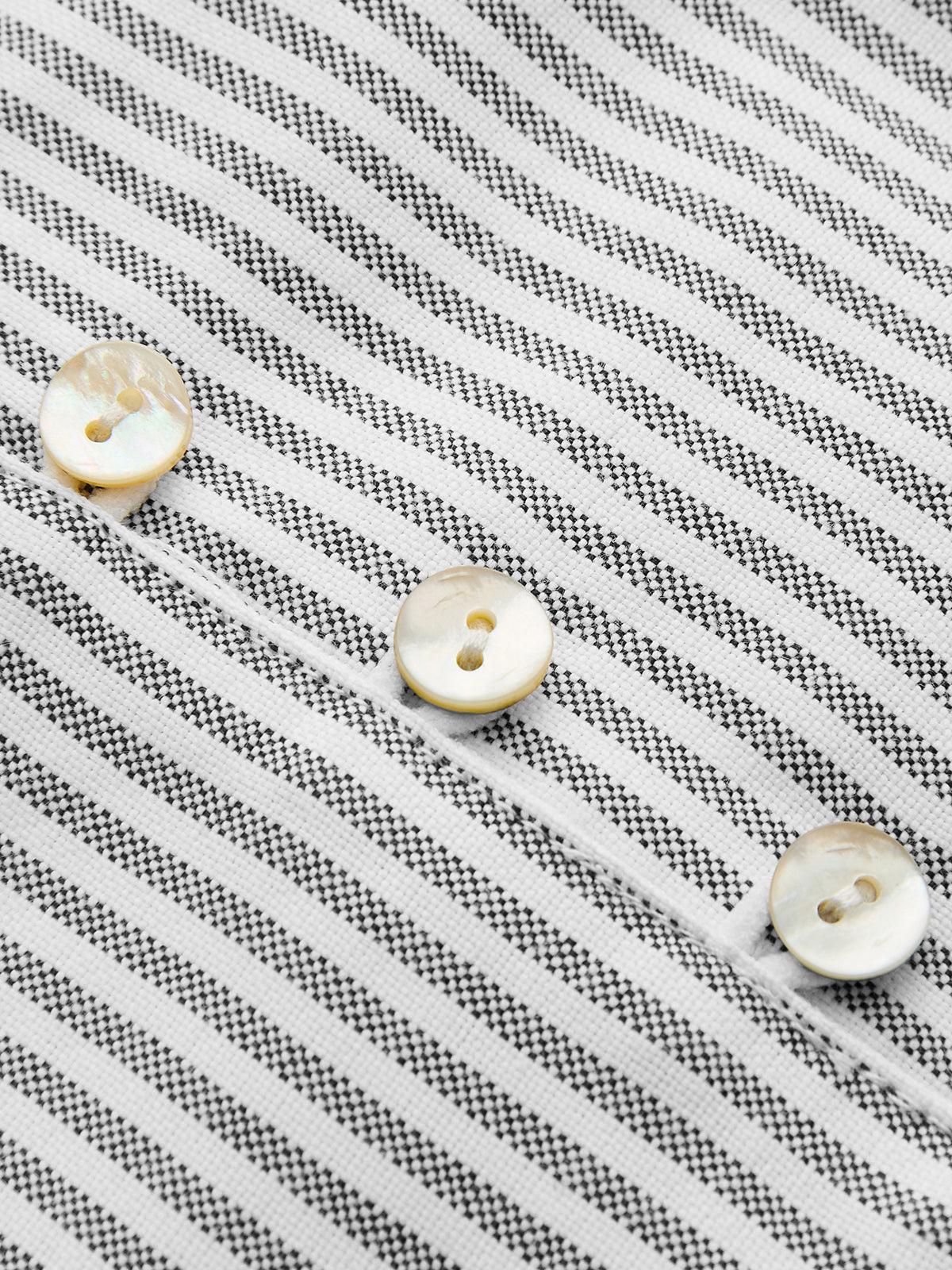 Paulien | Gestreepte tank top met strikdetail en knopen