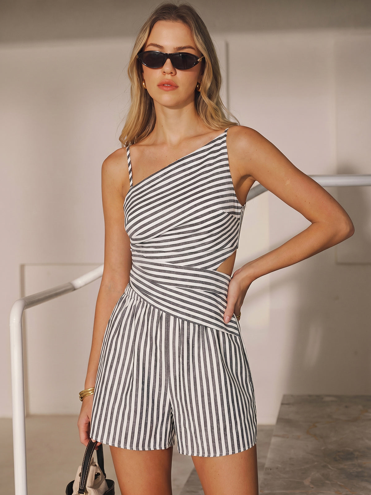 Rozy | Gestreepte set met cut-out detail