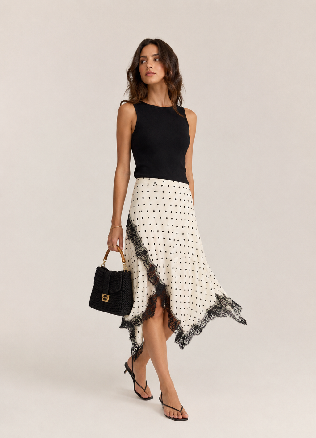 Anique | Satijnen midi rok met stippenprint en kanten details
