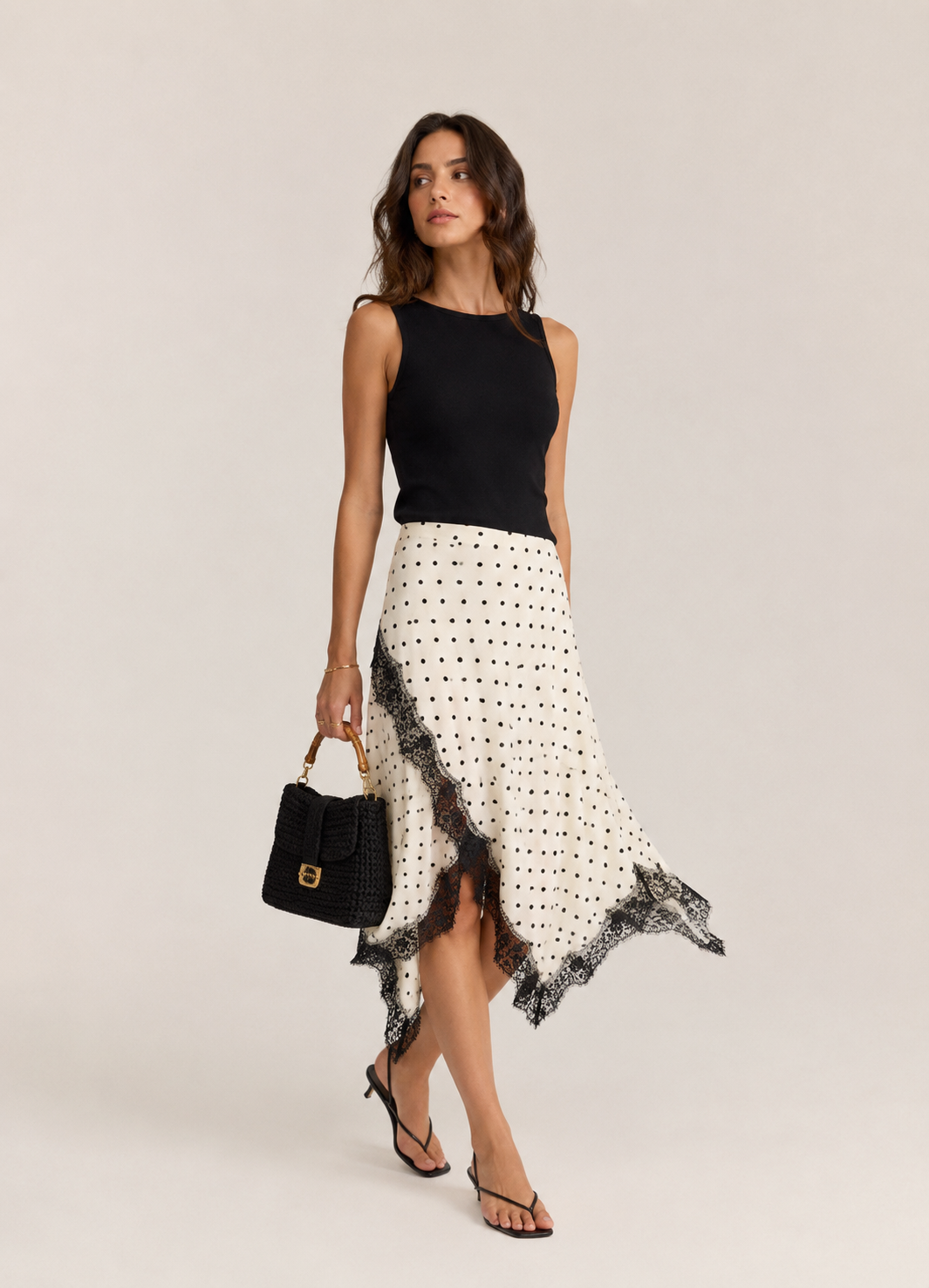 Anique | Satijnen midi rok met stippenprint en kanten details