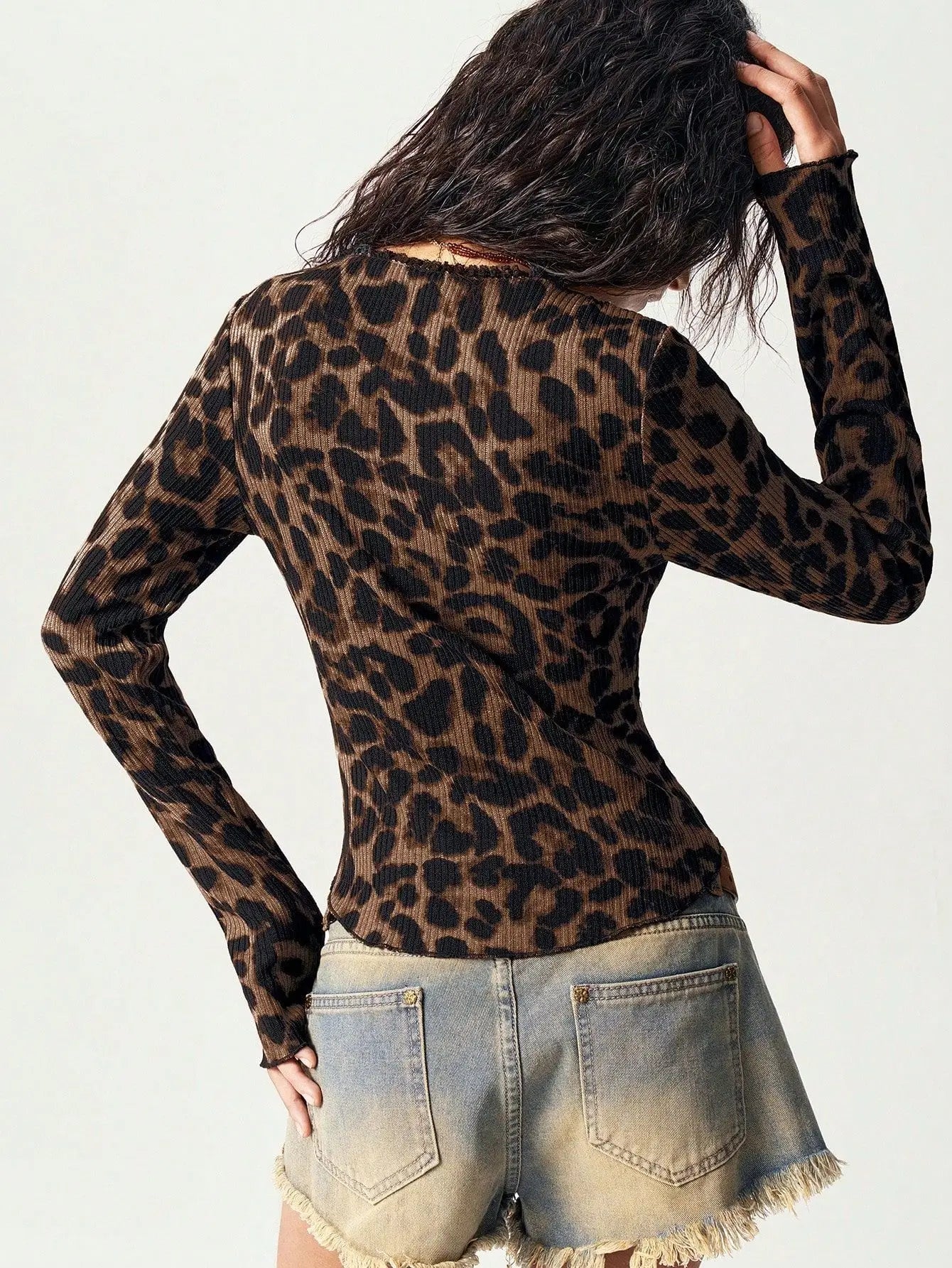 Nova | Top met luipaardprint en lange mouwen