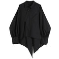Noa | Blouse met asymmetrische zoom