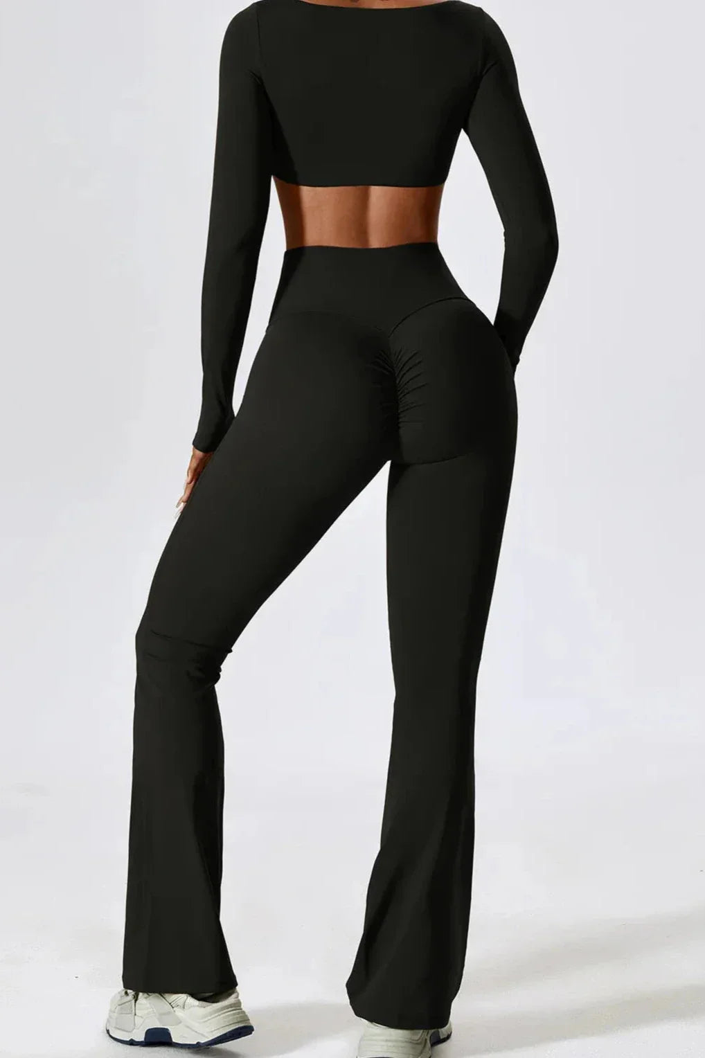 Sara | Sportset met longsleeve crop top en flared legging