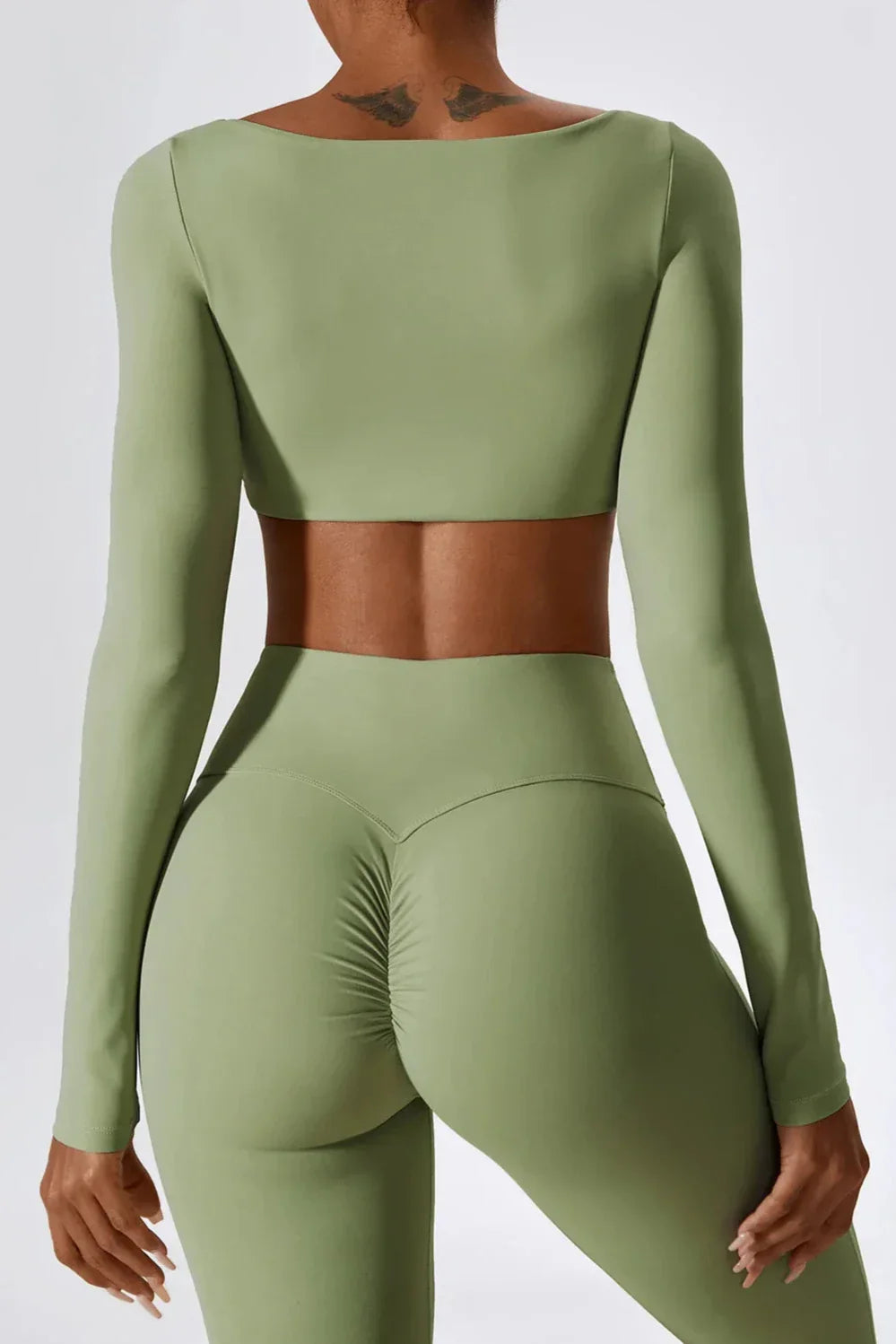 Sara | Sportset met longsleeve crop top en flared legging