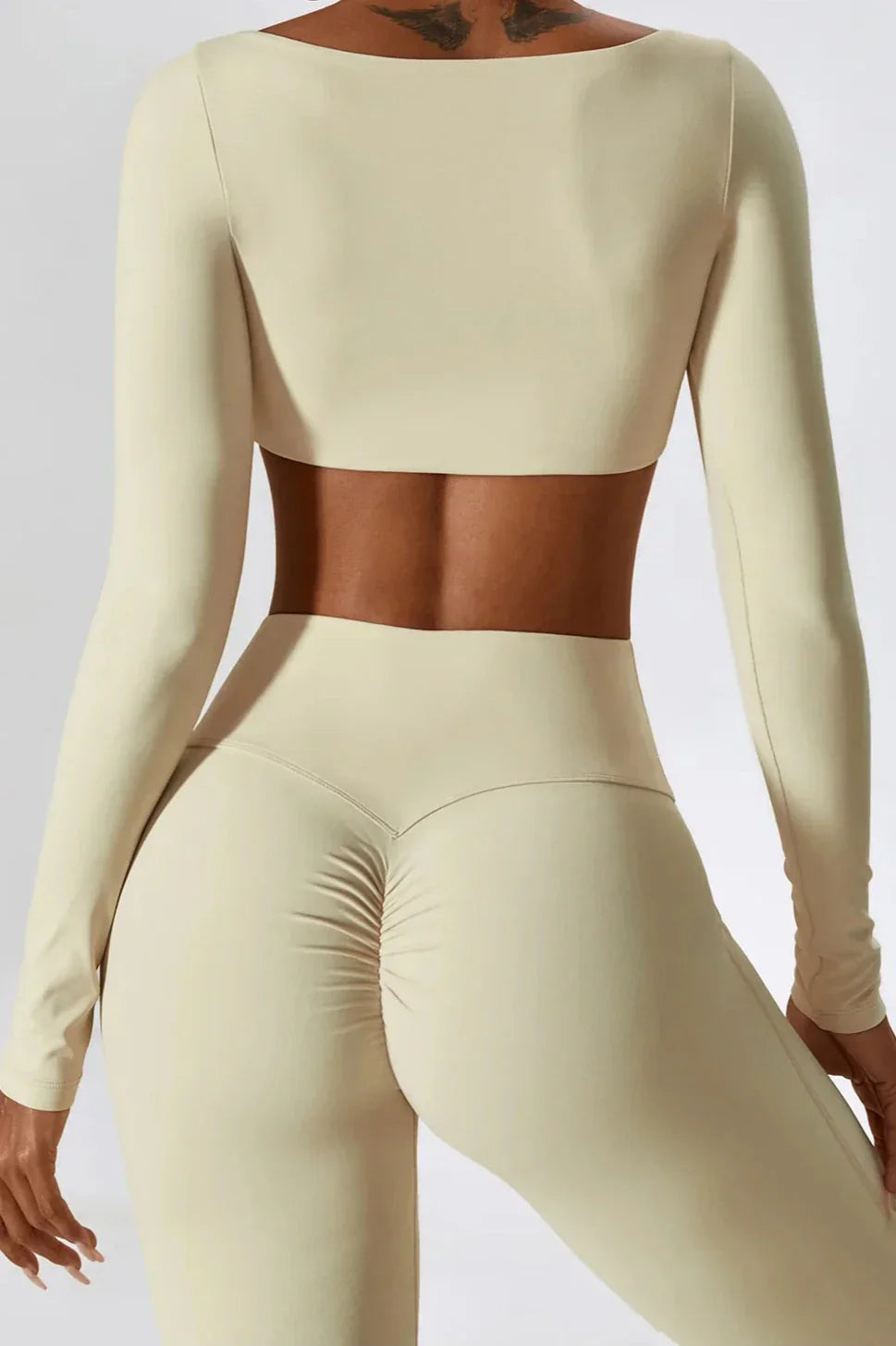 Sara | Sportset met longsleeve crop top en flared legging