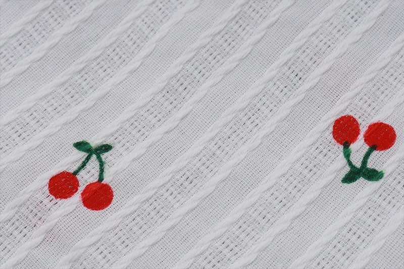 Livia | Haltertop met kersenprint