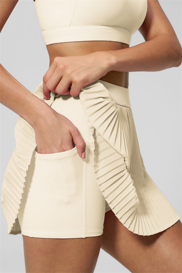 Noor | Tennisrok met Accordeonplooien