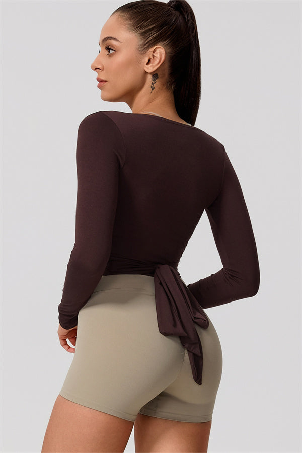 Hannah | Overslag longsleeve sporttop met striksluiting