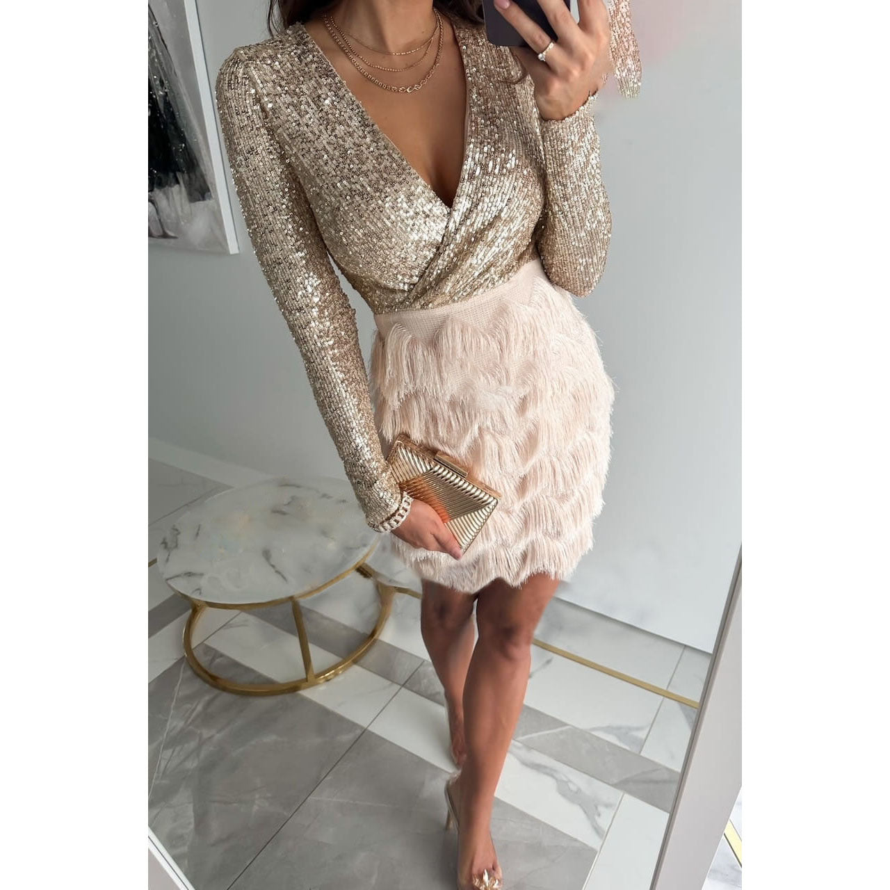 Nina | V-hals minijurk met glittertop en franjerok