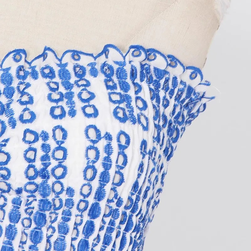 Stella | Strapless minijurk met broderie anglaise