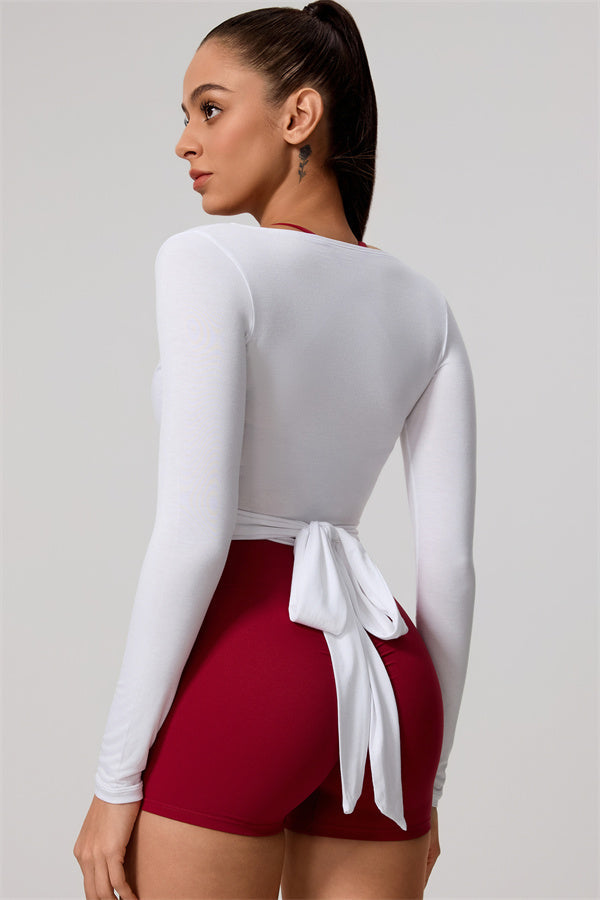 Hannah | Overslag longsleeve sporttop met striksluiting